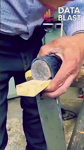Hammering Wooden Wedge to Fix Axe Head #shorts