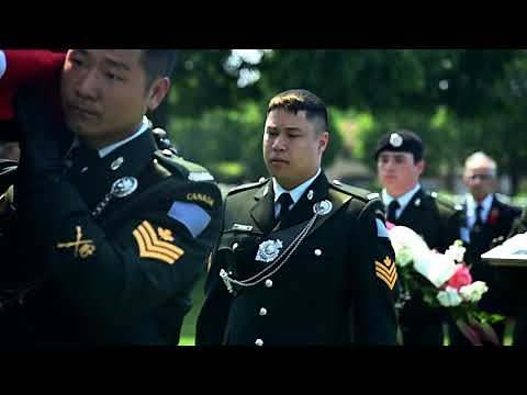 Burial of three Canadian soldiers of the First World War at Loos British Cemetery in France