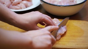 Preparing chicken meat in fillets - Free Stock Video