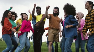 a group of young people having fun in the park