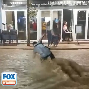 Umm... DO NOT DO THIS. A person attempting to cross a flooded street in Cassis, France, Thursday night underestimated the power of the rushing floodwaters. | FOX Weather