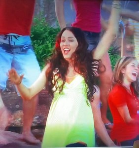 In High School Musical 2 [2007] Miley Cyrus makes a brief cameo in the final song of the movie. Credited as “Girl at Pool”.