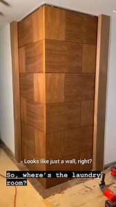 🧺 Where’s the laundry room? You’ll never guess! 👀 Hidden behind this stunning folding wood wall lies a fully functional laundry space — sleek, smart, and space-saving! Perfect for modern homes that love clean design and clever storage solutions. ✨#fblifestyle #HiddenDoorDesign #LaundryRoomGoals #SmartHomeIdeas #InteriorDesignTrends #SpaceSavingDesign #HomeInspiration #ModernInteriors | Aluminium Glass Design