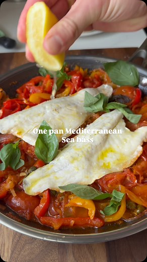 One pan Mediterranean Sea bass Save the full recipe below This is a one pan favourite of mine for an easy summer dinner. Flavours of the med with beautifully steamed fish. Make sure you have some good bread to mop up the delicious sauce in the pan 2 tbsp olive oil 2 garlic cloves, sliced 2 red onions, cut into 1cm slices 2 mixed colour peppers, thinly sliced 4 large ripe tomatoes, quartered 2 tbsp capers Zest and juice of 1 lemon 1 small bunch of basil, leaves picked 200ml white wine (optional -