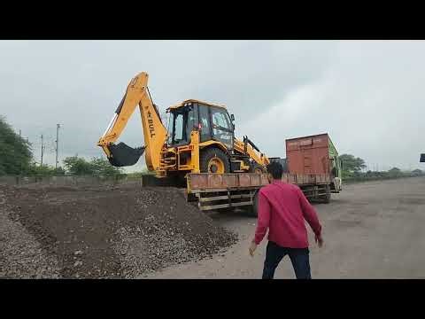 Bull machine unloading from trailer #bulljcb #bullbackhoe #bullmachines