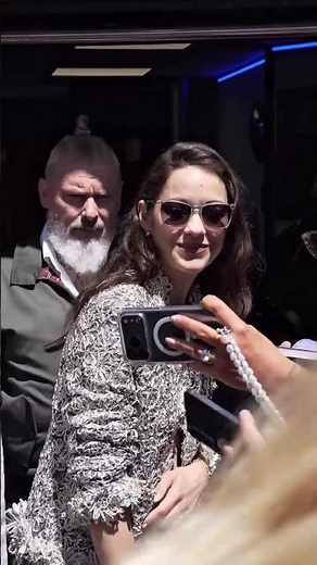 Marion Cotillard leaving the Palais des Festivals after the Roma Elastica photocall at the
