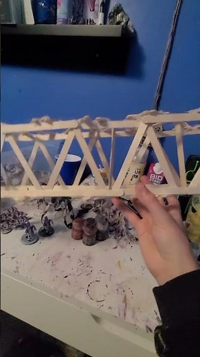 bridge made out of popsicle sticks (can hold over 50 pounds)
