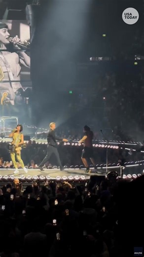 A Katy Perry fan ran on stage during the popstar's hit song, "Hot N Cold." Security guards removed the overzealous fan at Perry's concert in Sydney. | Milwaukee Journal Sentinel