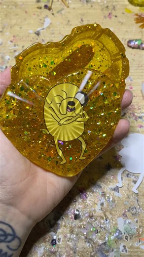 Jake the frigggin dog! I have a few more cuties to make for my Adventure Time container collection, it was about time I did a cute little Jake one💛 #fyp #adventuretime #resinart #glitterart | Simply Spacey