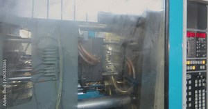 Injection molding thermoplastic machine. The process of creating a plastic part by injection molding