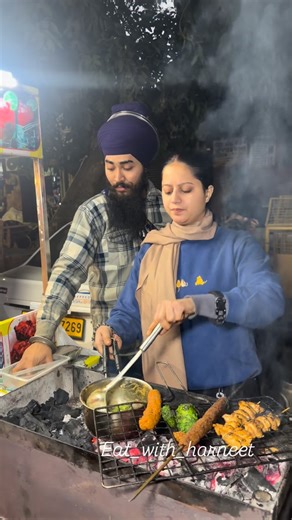Harneet Kaur on Instagram: "Beautiful Gurusikh Couple ka ultimate Street food 😍 #food #indianstreetfood #nihang #sikhblogger #foodporn Unique street food in India , Delhi street food"