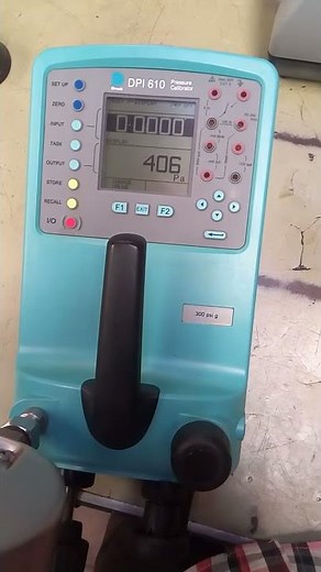 GE DRUCK DPI 610 PORTABLE PRESSURE CALIBRATOR (-0.95) TO 20 BAR