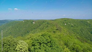 Beautiful landscape of swabian alb and beautiful forest at Beuren - Paragliding around castle Hohenneuffen in Southern Germany with a view on Neuffen, Esslingen, Stuttgart