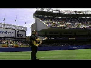 Paul Simon sings "Mrs. Robinson" on DiMaggio Day in 1999