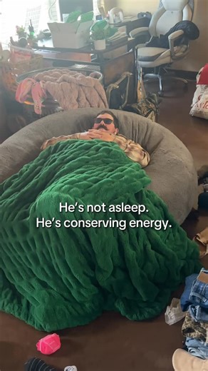 Cody and Erika Archie | He’s not asleep. He’s conserving energy. 😎💤 | Instagram