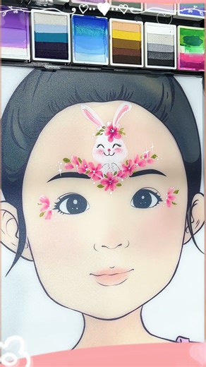 Anka Bella on Instagram: "Bunny face painting is always a huge favorite! Cute ears, a soft pink nose, and glowing highlights— as soon as kids see it, they get super excited: “I look like a bunny now!!” ✨🐰💗 It’s simple, adorable, and very photogenic, perfect for booths, birthday parties, and holiday events. A quick design that always becomes a crowd favorite! Want to learn this Bunny face painting? Comment “Want to learn,” and I’ll teach you step by step! 👇 #BunnyFacePainting #KidsFacePainting