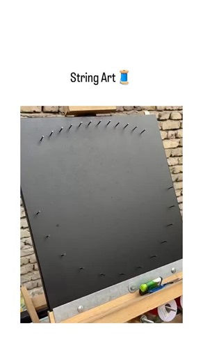 TrendSnap on Instagram: "The post showcases a 38-second video of hands methodically weaving multicolored threads—starting with green and progressing to yellow and red—across nails on a black board to craft a radiant, fan-like abstract design, captioned simply "String Art" to launch a thread. , known for reviews and business inquiries, the January 2, 2026, upload exploded to 951 likes and 123,000 views in under a day, fueled by enthusiastic Indonesian replies praising its "keren" (cool) aesthetic