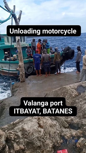Unloading motorcycle | Valanga Dockside