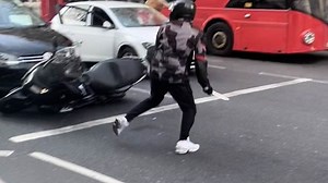 Moped chases motorbike rider 'who wrestled machete off him'