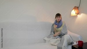 The girl caught a cold, is sick. She has problems with her throat and head, as well as a cough.