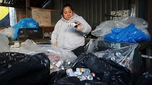 They gather up cans and bottles on NY streets for recycling. And they could use a raise