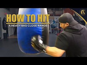 How to Hit a heavy bag Close Range | Coach Anthony Boxing