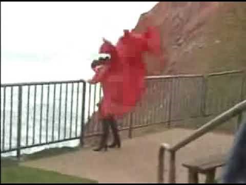 Windy Stormy Red Taffeta Satin Dress Blowing Violently