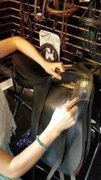 How to put leathers and irons on an english saddle.