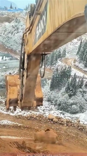 The process of an excavator clearing large rocks