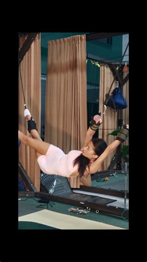 World's Deepest Stretch Technology on Instagram: "Before anything moves, everything is prepared. Her wrists and ankles are carefully secured — not for drama, not for show — but for precision, balance, and safety. Then, slowly and smoothly, she’s lifted on the Pravilo Stretching Machine, her body rising into suspension with calm control. No struggle. No tension. Only trust. This setup allows the body to fully relax while being evenly supported — creating a deep, full-body stretch that’s impossibl