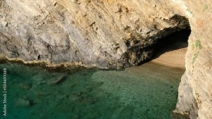 Video of Little Cave Beach near Karavostasi beach on Bali mediterranean resort, Crete, Greece.