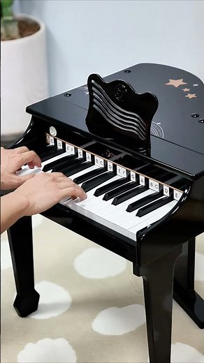 Black Grand Piano | Introducing our Wooden Black Grand Piano Toy - where elegance meets playtime!