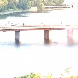 New video shows flames, smoke billowing from an Orange Line MBTA train on a bridge over the Mystic River. One passenger's daring escape: https://www.wcvb.com/article/orange-line-train-catches-fire-with-passengers-onboard-on-bridge-over-mystic-river-in-somerville-mbta/40675879 | WCVB Channel 5 Boston