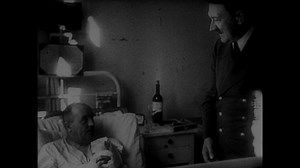 1940s: Hitler and officers visit wounded soldiers in hospital. Civilians salute Hitler as he leaves hospital building. Hitler and officers greet men and soldiers with handshakes.
