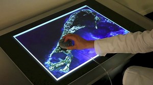 Jamming User Interfaces: Programmable Particle Stiffness and Sensing for Malleable and Shape-Changing Devices