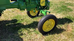 This John Deere 320, 1956, restored to show condition, will be sold at auction on Saturday, March 30th! Join us then for a HUGE auction of collector tractors & farm machinery! https://www.rogersauctiongroup.com/auctions/detail/collector-tractor-farm-machinery-auction-bw35216 | Rogers Realty & Auction Company, Inc. | Facebook
