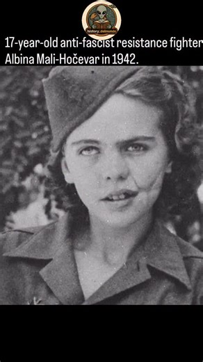 Mali-Hočevar joined the anti-fascist underground in what is now Slovenia while it was under Axis occupation. Like many teenagers drawn into resistance networks, she served as a courier, lookout, and organizer—roles that required nerve as much as strength. Capture meant imprisonment, torture, or execution, not only for fighters but often for their families as well. Across Yugoslavia, the resistance grew into one of the largest in occupied Europe, with an estimated 800,000 participants by the war’