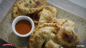 3K views · 134 reactions | These flaky, golden empanadas — filled with scrambled eggs, bacon, spinach, and Cheddar cheese — make a perfect on-the-go breakfast. Watch as Chef Alyssa's Kitchen makes them for us in our cooking series In the Kitchen. For the full recipe, visit www.ourstate.com/in-the-kitchen-breakfast-empanadas. | Our State Magazine | Facebook