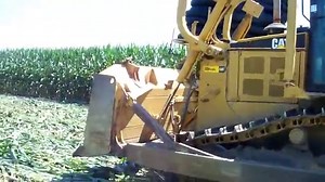 Installing field tile with a Soil Max Gold Digger plow & D6R dozer