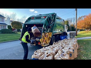Waste Management Garbage Truck Packing Peak Season Piles