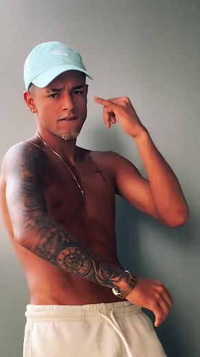 Exploring Tattoo Art on a Sculpted Male Physique