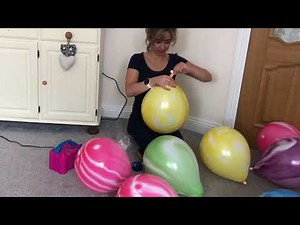 marble themed balloon blowing up