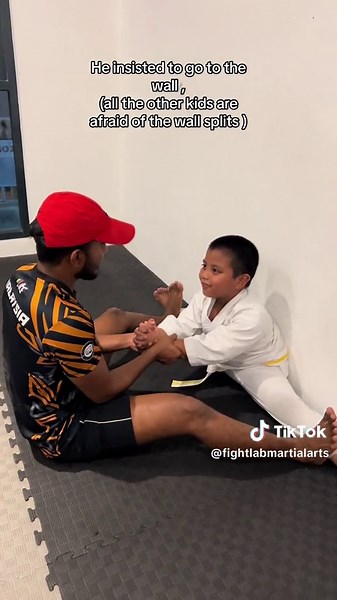 Kids Taekwondo Class Wall Splits Challenge