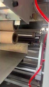 Automatic stretch film roll rewinding machine from jumbo wrapping film roll #machine #stretchfilm