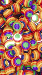 Pack of colored spheres moving and colliding with each other 3d animation