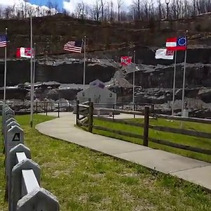 The Pound Gap Civil War Memorial in Letcher County, Kentucky, just across the state border from Pound, Virginia. The memorial is built along what had been a bitterly contested supply line. The brief video captures the flags flapping in the wind, one of the few times that a picture couldn't quite capture the effect. Three separate battles and a few other skirmishes took place at Pound Gap between Union and Confederate forces. Initially, General Humphrey Marshall created breastworks designed to de
