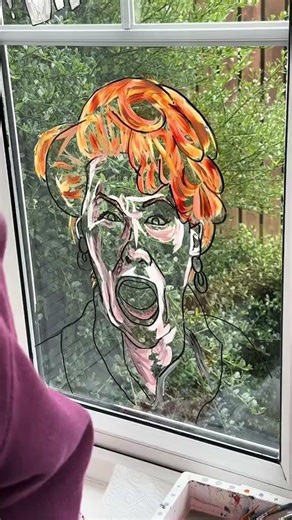 Creative Christmas Window Art with Iconic Movie Characters