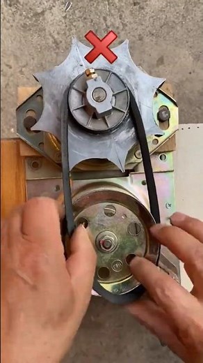Install Motor Drive Belt with Rope Trick.