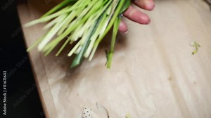 Florist Hands is Cutting Flower Stems with Scissors. A Florist Preparing a Modern Bouquet of Flowers Stock Video