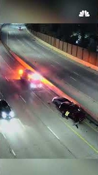 Man climbs onto median wall to avoid oncoming vehicle in closed flex lane